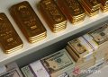 Emas menguat didorong pelemahan dolar AS dan arus masuk "safe haven"