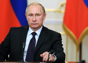 Pesan di Balik Klaim Kemenangan Putin yang Mengenakan Seragam Kamuflase di Ukraina