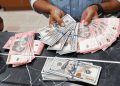 Rupiah Jebol Rp18 Ribu per Dolar AS, BI Turun Tangan Tahan Tekanan