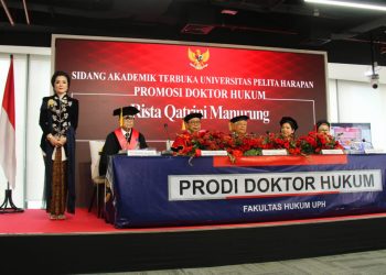 AIA Director Earns Doctorate with Magna Cum Laude