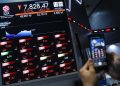IHSG Climbs 1.49% to 6,218 at Midday Trading