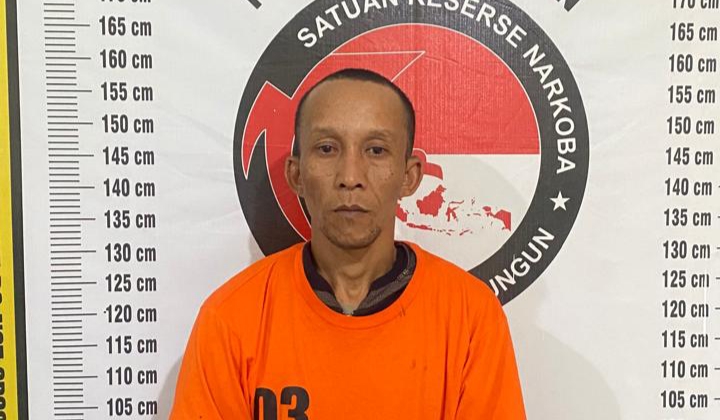 Tersangka AS diamankan polisi. (ist)