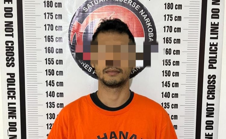 Tersangka diamankan polisi. ist