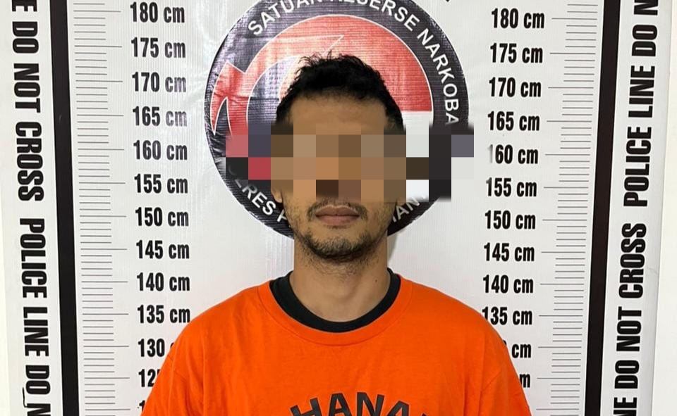 Tersangka diamankan polisi. ist