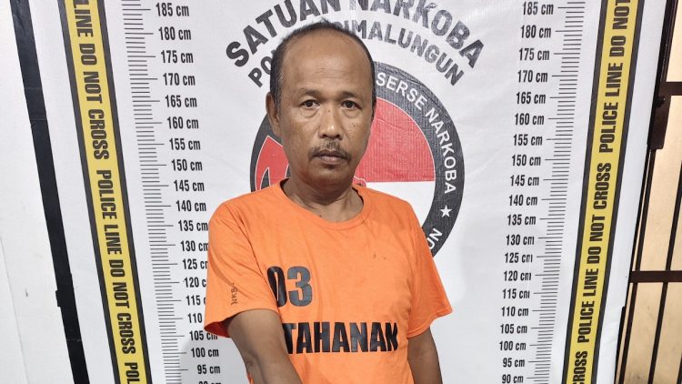 Tersangka diamankan polisi. ist