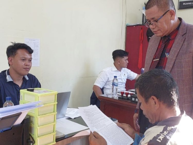 Ferry SP Sinamo,SH
MH,CPM CPArb mendampingi Horas Hasugian di Mapolres Papkak Bharat.