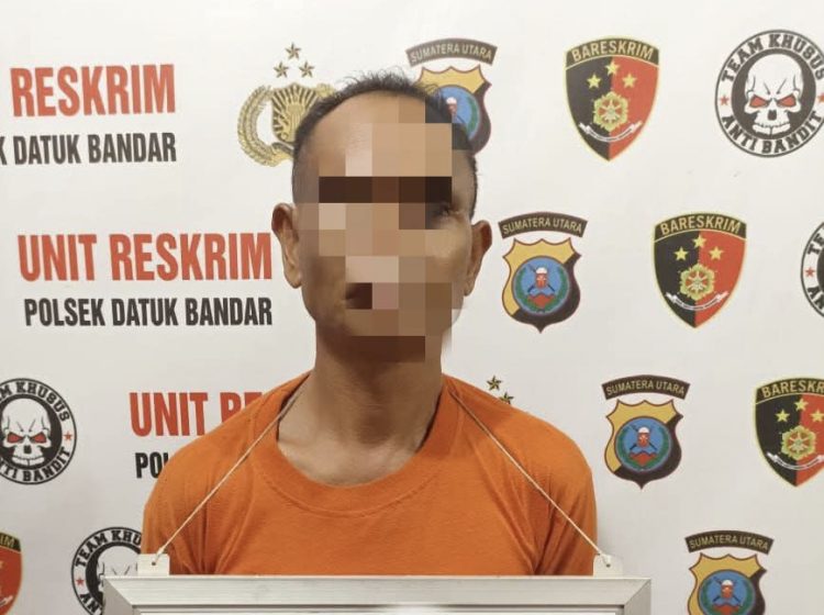 Tersangka SZ (52), warga Dusun III, Desa Pulau Maria, Kecamatan Teluk Dalam, Kabupaten Asahan.