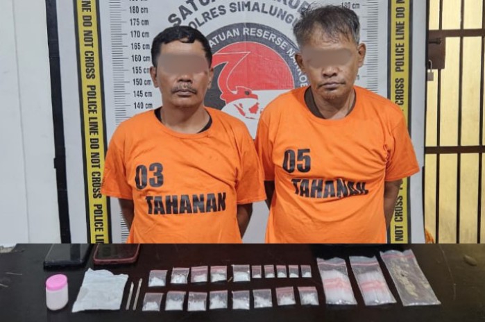 Dua tersangka yang dibekuk petugas