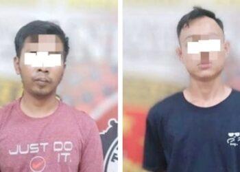 Dua pria yang berasal dari Simalungun yang tertangkap bermain judi online (judol). (Foto Ist)