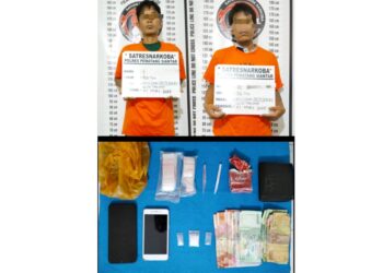 Kedua tersangka, JA dan ESP beserta barang bukti