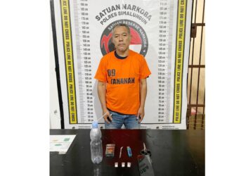 Tersangka HS dan barang bukti