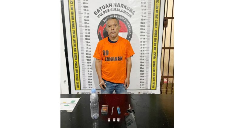 Tersangka HS dan barang bukti