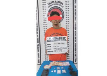 Tersangka YP alias Yogi beserta barang bukti