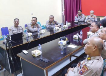 Kapolres Simalungun AKBP Marganda Aritonang, S.H. S.I.K. M.M mengikuti Rapat Implementasi Pelaksanaan Pelayanan Polisi 110 secara daring