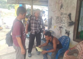 Tersangka IP saat ditangkap Kanit Jatanras IPDA Ricardo Rajagukguk S.Sos dan Tim