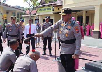 Kapolres Tanjungbalai, AKBP Yon Edi Winara S.H. S.I.K. M.H pimpin upacara kenaikan pangkat Kasat Binmas Kompol Eddy Siswoyo dan Kasat Lantas Kompol Agustinus Banjarnahor 