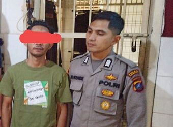 AN alias Tupong saat mau di tahan di ruang tahanan polisi Mako Polres Pematangsiantar 