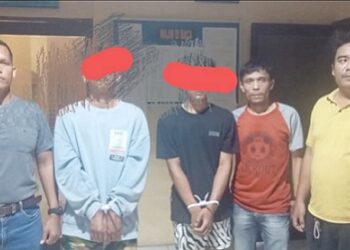 Kedua Pelaku Curat, Randy dan Daniel diapit Kanit Reskrim IPDA Juhandya Malau SH dan Tim