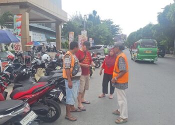 Kanit Jatanras Sat Reskrim IPDA Ricardo Rajagukguk S.Sos saat amankan kedua juru parkir