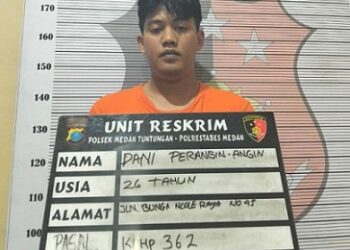 D.Perangin agnin Pelaku pencurian uang dengan membobol saldo rekening teman kosnya