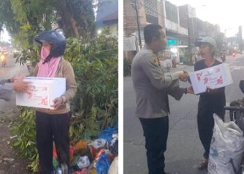 Kapolsek Siantar Timur IPTU Edy J.J. Manalu SH. MH saat bagikan bansos kepada Ibu Jesika Pardede dan Bapak Lamhot Sitohang