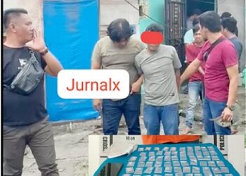 tersangka HH alias Coro saat ditangkap Kasat ResNarkoba AKP Jonni H. Pardede SH bersama Kanit Idik 1 IPDA Warman Siallagan SH dan Tim Opsnal