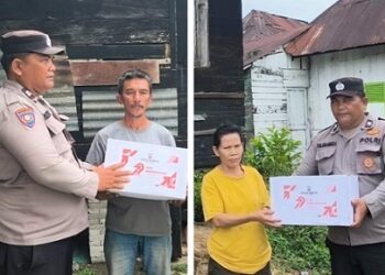 Polsek Siantar Marihat melalui Bhabinkamtibmas AIPTU Poltak Sinambela saat berikan bansos kepada warga Bola Jimmi Simanjuntak dan Riamin br Simanjuntak