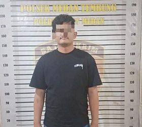 Pelaku pemerasan yang mengaku anak Kasat Narkoba Polrestabes Medan. (Foto Ist)
