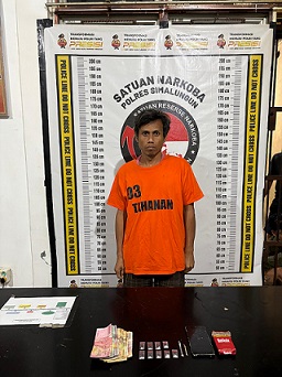 Pelaku Darma Indra Damanik dan barang bukti