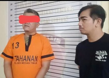 Polisi mengamankan GT diduga otak pencurian bantalan besi rel kereta api. (Foto Ist)
