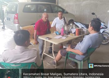 Kanit Reskrim IPTU Fritsel G. Sitohang, SH, MH dan personil Unit Reskrim melakukan pengecatan Kilang Padi Jaya Lestari