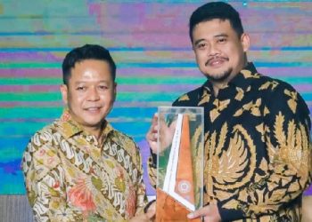 Rektor USU Prof. Muryanto Amin - Gubsu Bobby Afif Nasution. (Foto Ist)