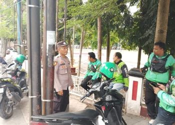 Piket Bhabinkamtibmas Aipda Julham E. Saragih dan Bripka Edward Sitompul melaksanakan patroli pagi hari