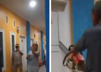 Aksi nekat Ervina Afnita Sitompul membelah pintu kos memakai singso di Cozy Kos Jalan Kuali, Gang Dame Dalam, Kelurahan Sei Putih Tengah, Kecamatan Medan Petisah karena tak mendapat bagian setelah bercerai dengan suami. (Foto Ist)