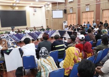 Kapolres Simalungun AKBP Marganda Aritonang, S.H., S.I.K., M.M menghadiri rapat koordinasi strategis di Aula Balei Harungguan Djabanten Damanik, Kantor Bupati Simalungun, Kecamatan Pamatang Raya