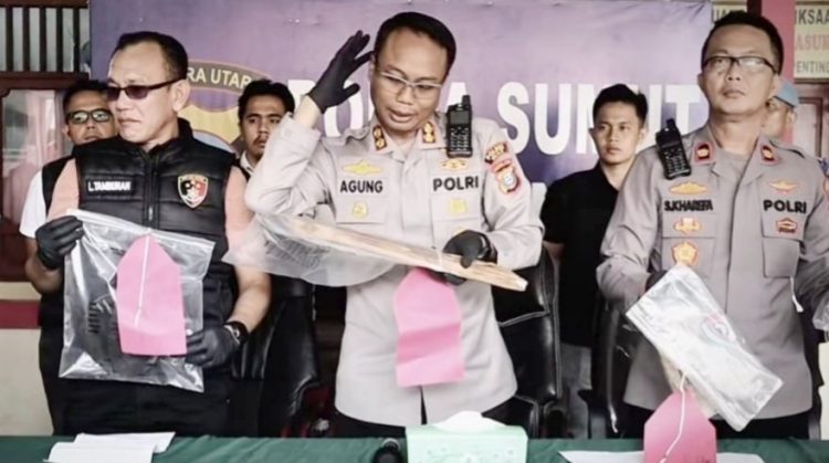 Kapolres Nias, AKBP Agung SDC saat paparan peristiwa penganiyaan anak kepada ayah. (Foto Ist)