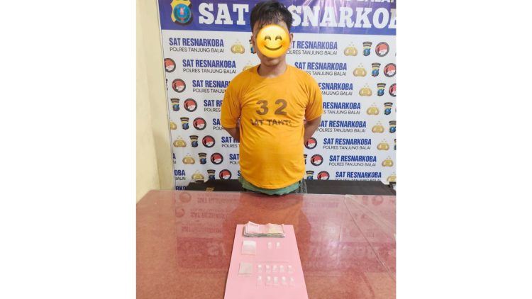 Tersangka MP alias U dan barang bukti