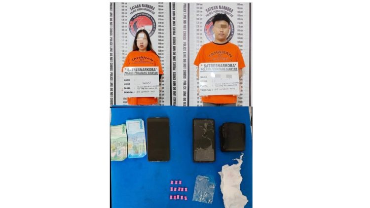 Kedua tersangka SW dan DT beserta barang bukti