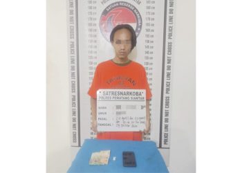 Tersangka EP alias F dan barang bukti