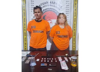 Kedua pelaku, Masdi Tarigan dan Meysinta Halawa beserta barang bukti