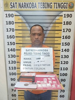 Tersangka JF dan barang bukti