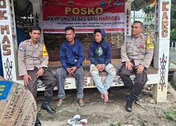 Piket Bhabinkamtibmas melaksanakan sambang di Posko Kampung Bebas dari Narkoba (KBN) Jalan Gunung sinabung