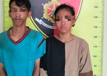 Pasutri yang ditangkap polisi. (Foto Ist)