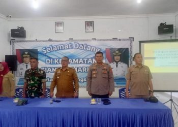 Kapolsek Siantar Marihat AKP Doni Simanjuntak SH menghadiri Pertemuan Miniloka Karya Lintas Sektoral UPTD Puskesmas Parsoburan Tahun 2025