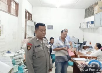 Kasub sektor Aiptu Edi Syahputra SH Monitoring kegiatan registrasi pendataan dan penempatan pedagang gedung 4 Pasar Horas
