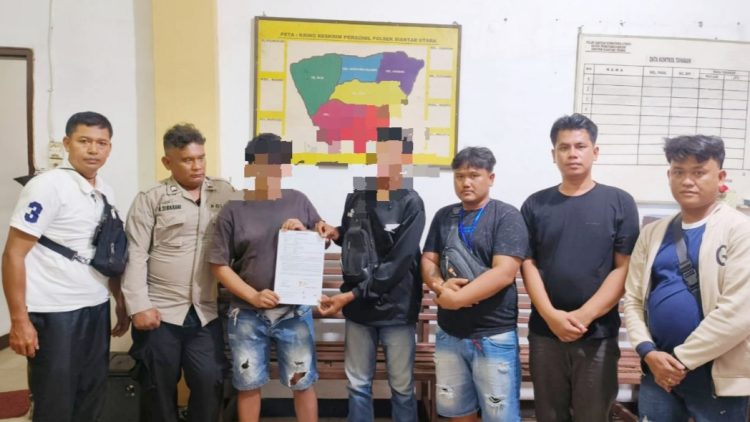 Kedua belah pihak saat berdamai di Polseķ Siantar Utara