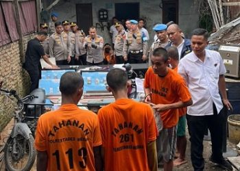 Kapolrestabes Medan Kombes Pol Dr. Jean Calvijn Simanjuntak saat paparan kasus kejahatan selama 22 hari kerja diarea dilokasi botot, Jalan Haji Anif, Percut Sei Tuan. (Foto Ist)