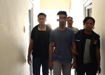 Pria berinisial PHAH yang  ditangkap tim Unit Pidum Satreskrim Polres Langkat di sebuah hotel di Kota Medan. (Foto Ist)