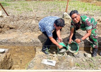 Wali Kota Pematangsiantar Wesly Silalahi SH MKn diwakili Sekda Junaedi Antonius Sitanggang SSTP MSi, bersama Deputi Bidang Kelembagaan dan Digitalisasi Kemenkop Henra Saragih SH MH MKn peletakan batu pertama pembangunan gedung Koperasi Kelurahan Merah Putih dan jembatan di Kelurahan Marihat Jaya Kecamatan Siantar Marimbun