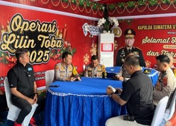 Kapolrestabes Medan Kombes Pol Dr. Jean Calvijn Simanjuntak, S.I.K., M.H pengecekan Pos Terpadu Operasi Lilin Toba 2025 di Lapangan Merdeka Medan. (Foto Ist)